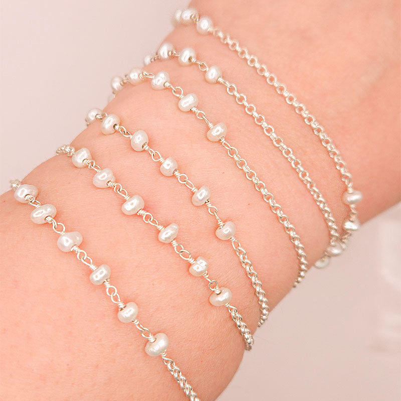 Silver overlay over copper mabe pearl beading and extender chain with polished links designed for elegant jewelry styling and handcrafted creations