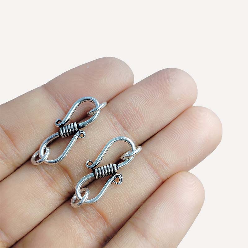 Silver overlay over copper hook from India handcrafted with double loop twisted wire design and oxidized finish