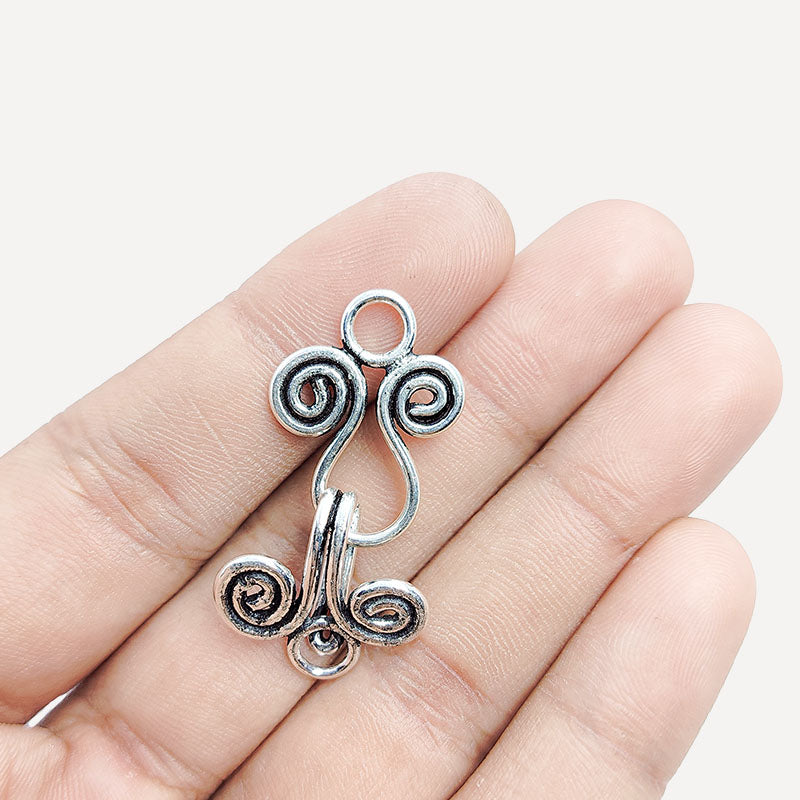 Silver Overlay Over Copper artisan spiral hook clasp handmade in India with antique oxidized finish.