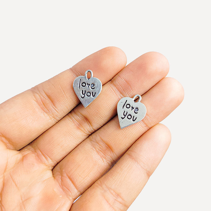 Silver Overlay Over Copper India heart love you charm with engraved message.
