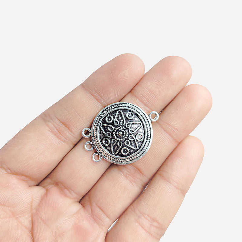 Silver Overlay Over Copper India round 3 loop floral connector with oxidized finish.