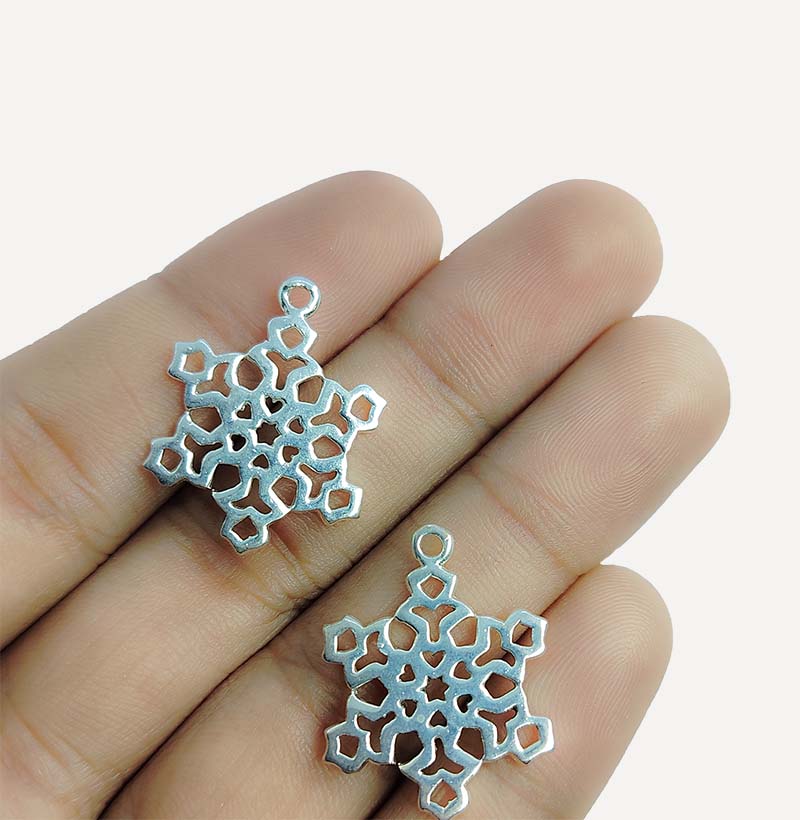 Silver Overlay Over Copper snowflake pendant handcrafted in India with antique oxidized finish.