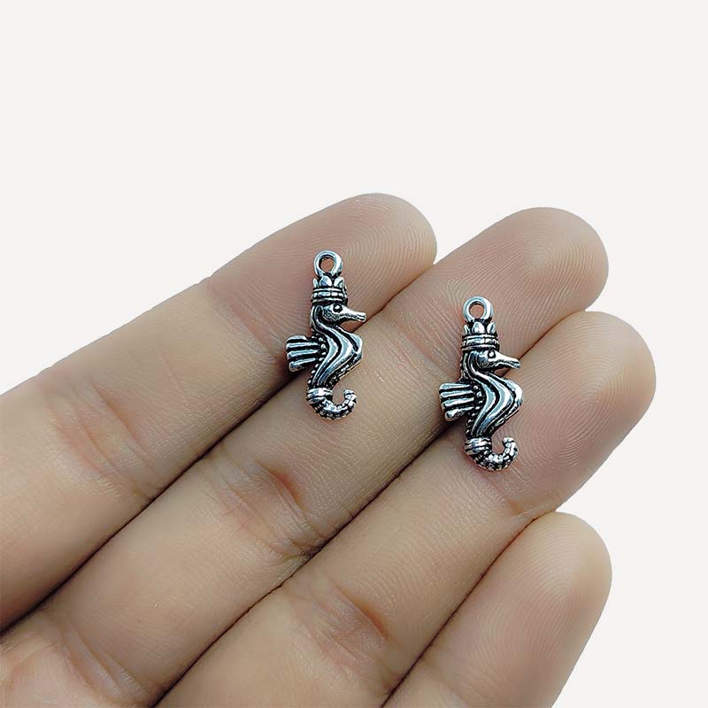 Silver Overlay seahorse pendant handcrafted in India with oxidized finish, perfect for nautical and DIY jewelry designs.