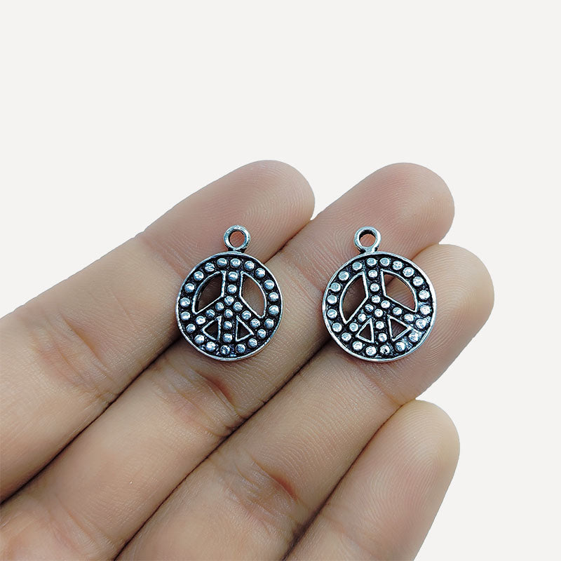 Silver Overlay peace symbol round pendant handcrafted in India with oxidized finish for boho and DIY jewelry designs.
