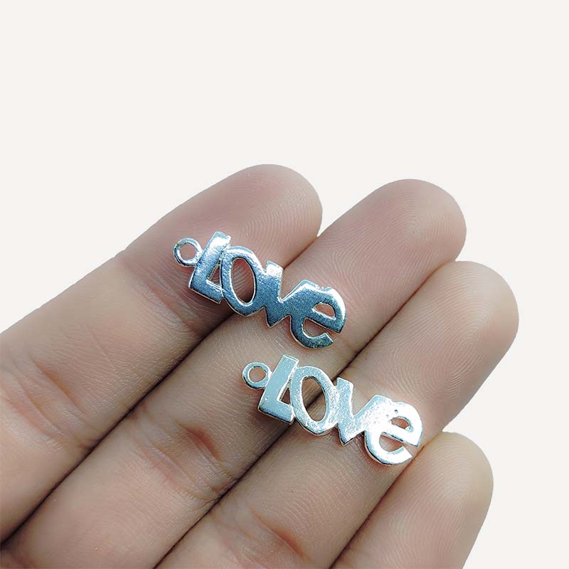 Silver Overlay Over Copper Love script charm handcrafted in India with vintage oxidized finish.