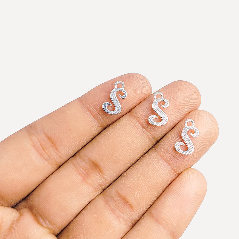 Handcrafted Silver Overlay Over Copper alphabet “S” charm from India with polished textured finish for handmade jewelry.