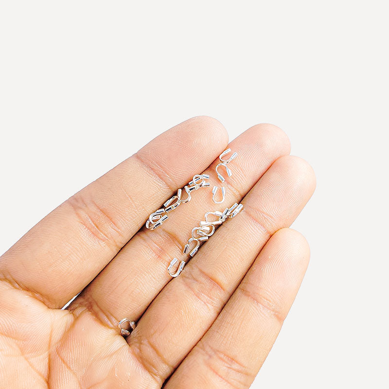 Handcrafted Silver Overlay Wire Guardian from India with polished silver overlay finish