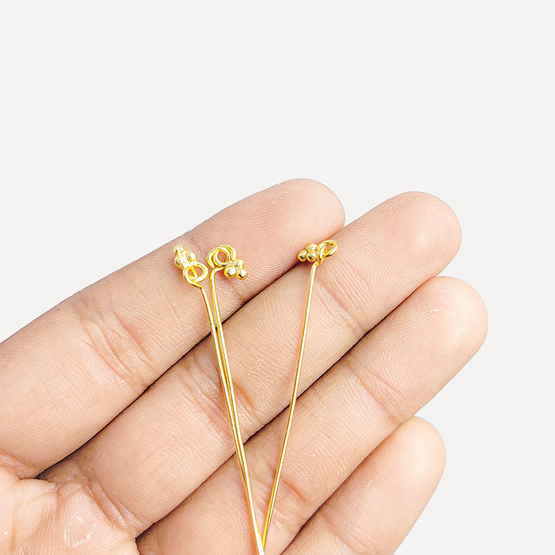 Artistic 18K gold overlay granulated eye pin handcrafted in India.