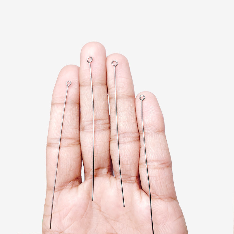 India handcrafted eye pin with black rhodium overlay over copper for retail jewelry crafting.