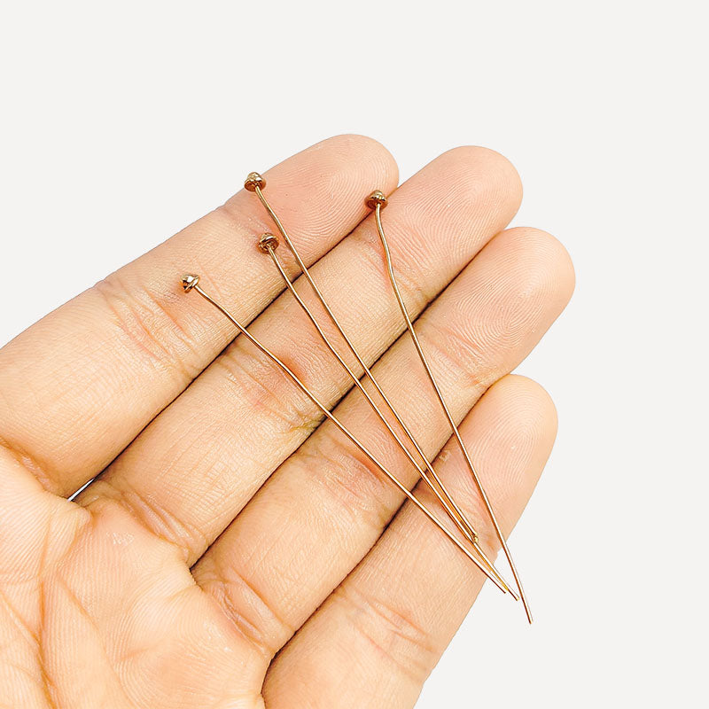 India handcrafted rose gold overlay over copper cone head pin for retail jewelry crafting.