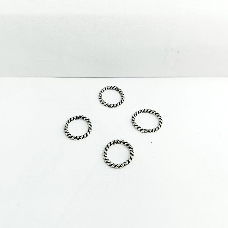 Elegant silver overlay twisted rope ring with oxidized finish, handcrafted in India, minimalist artisan jewelry.