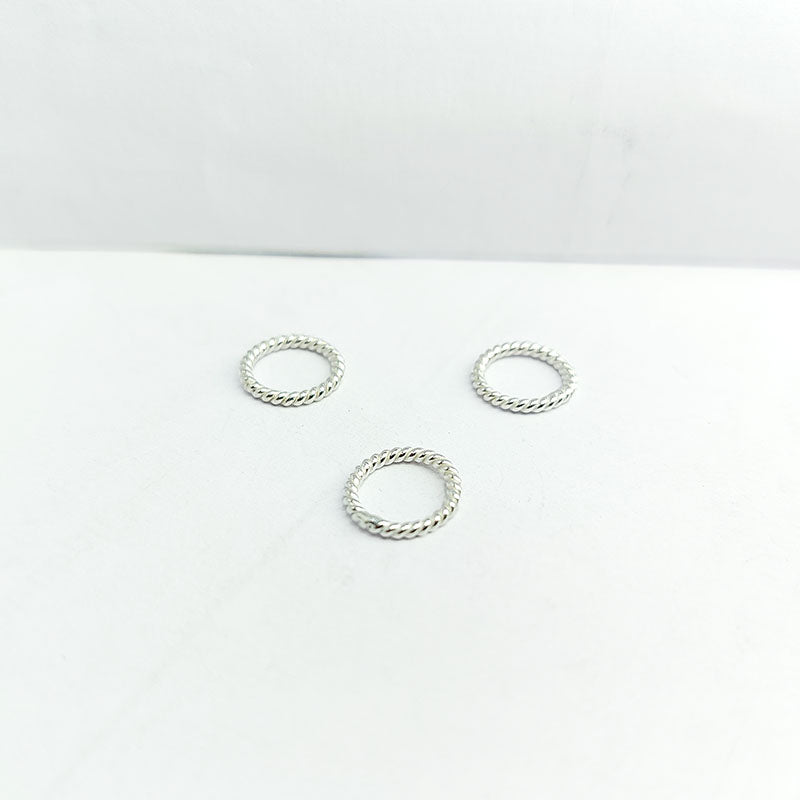 Elegant silver overlay twisted rope ring with oxidized finish, handcrafted in India, minimalist artisan jewelry.