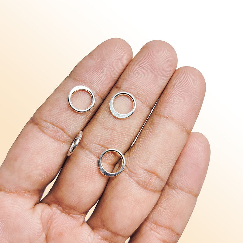 Elegant silver overlay textured hoop ring with oxidized finish, handcrafted in India, minimalist artisan jewelry.