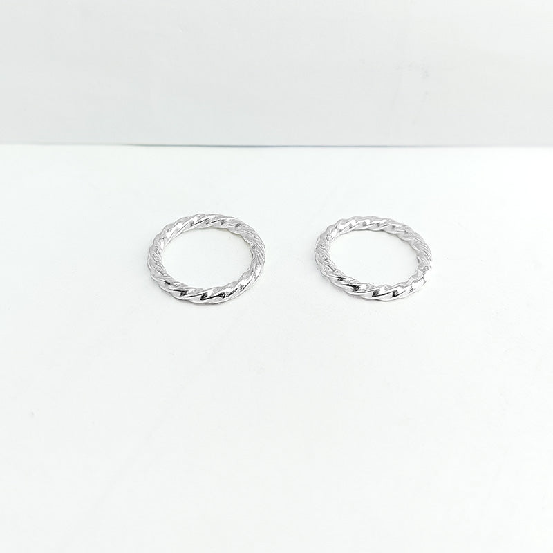 Rustic faceted twist ring finding with oxidized finish in silver overlay over copper, handcrafted in India
