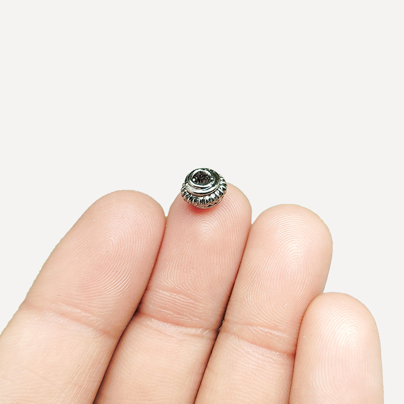 Handcrafted black rhodium overlay ridged floral copper spacer bead from India for modern jewelry designs