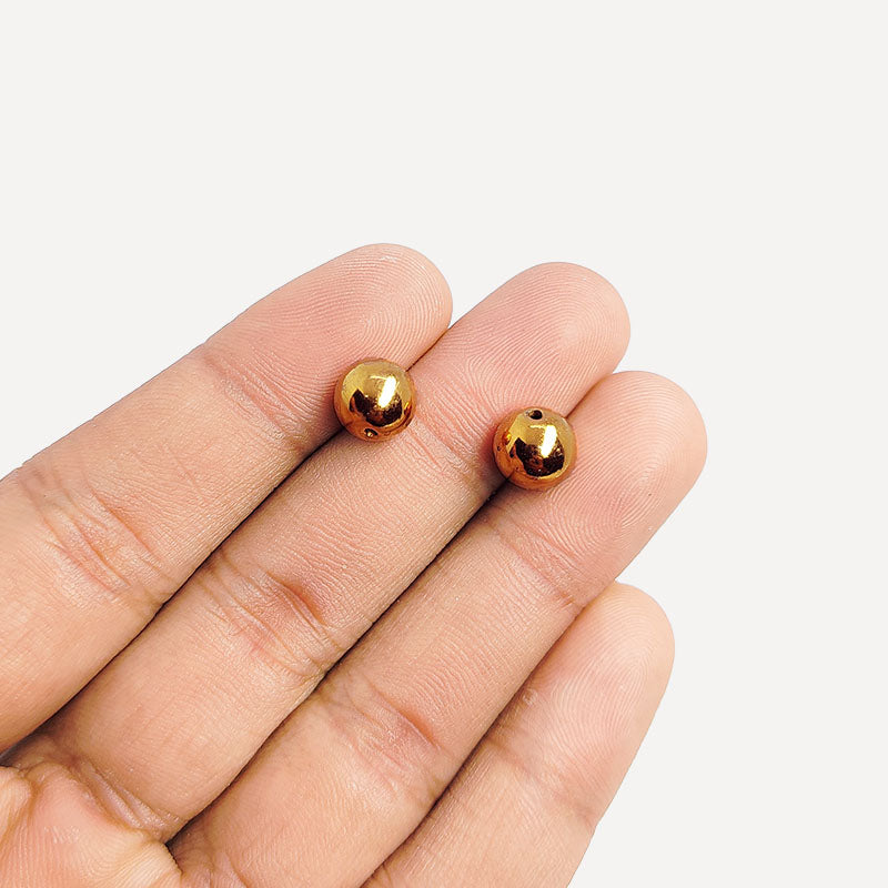 Polished Rose Gold Overlay round bead handcrafted in India for retail jewelry and DIY designs