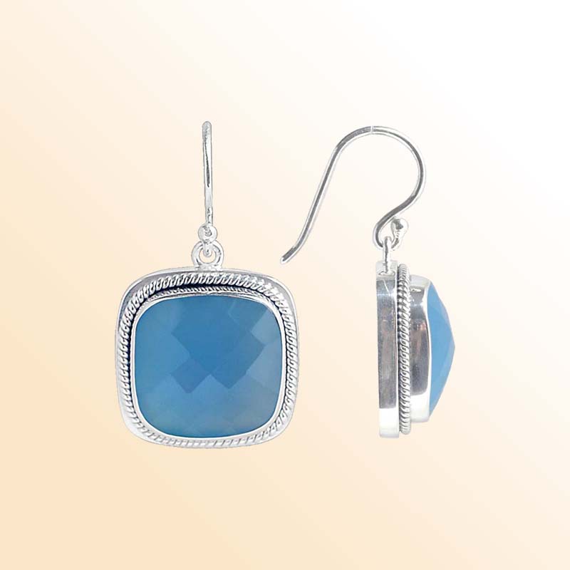 Handcrafted Sterling Silver earrings with Blue Chalcedony Quartz stones in a cushion bezel design with rope-edge detail.