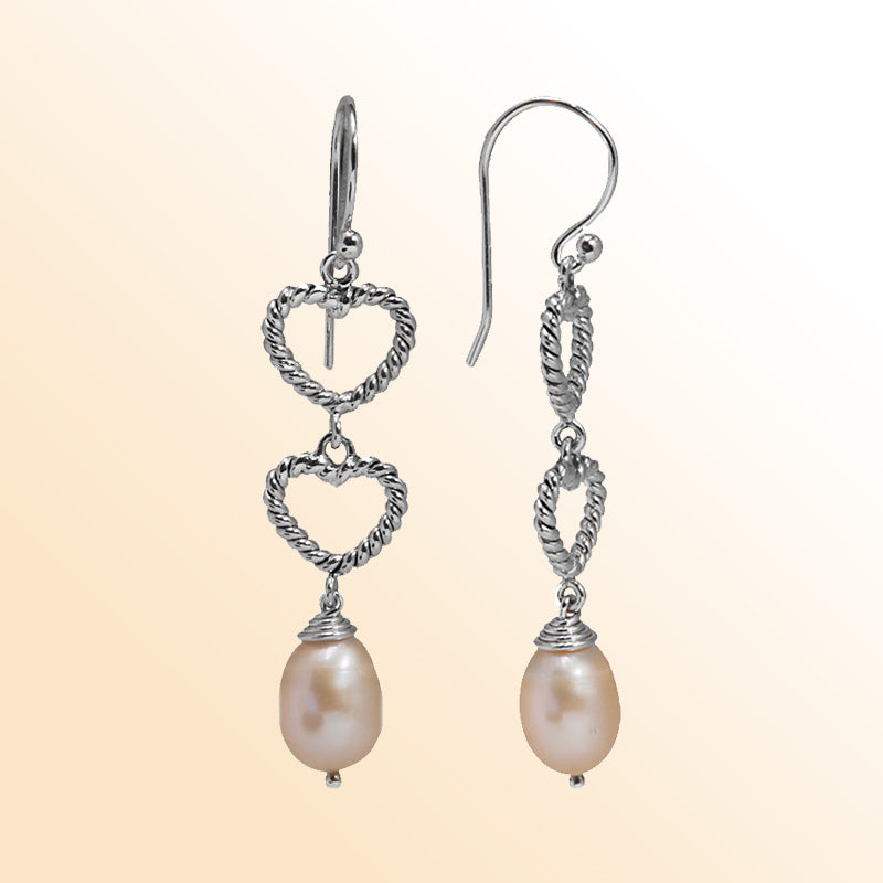 Handcrafted Sterling Silver earrings with Pink Fresh Water Pearl featuring double rope-textured hearts and a polished finish.