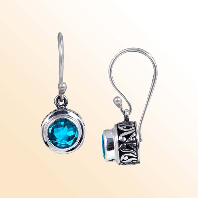 Handcrafted Sterling Silver Blue Topaz Quartz round earrings with Balinese carvings and polished finish.
