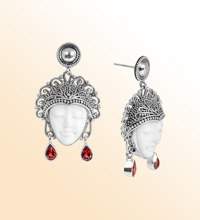 Handcrafted Sterling Silver Earrings With Carved Bone Face And Garnet Quartz Teardrop Design
