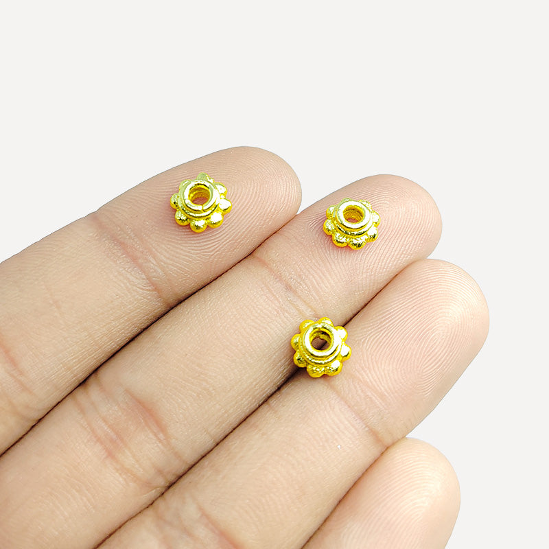 18K gold overlay over copper daisy spacer beads handcrafted in India with smooth polished floral design.