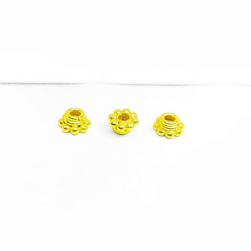 18K gold overlay over copper daisy spacer beads handcrafted in India with smooth polished floral design.