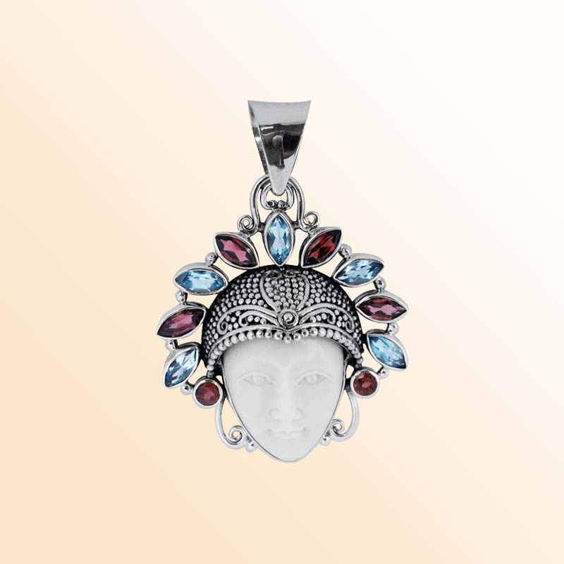 Balinese Sterling Silver Blue Topaz Quartz Garnet Quartz Bone Face Pendant With Artistic Headdress.