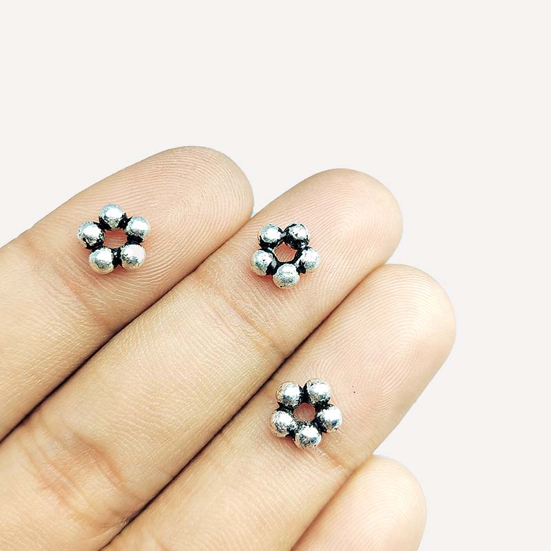 Silver overlay over copper small cluster spacer beads handcrafted in India with compact bubble design and polished finish.