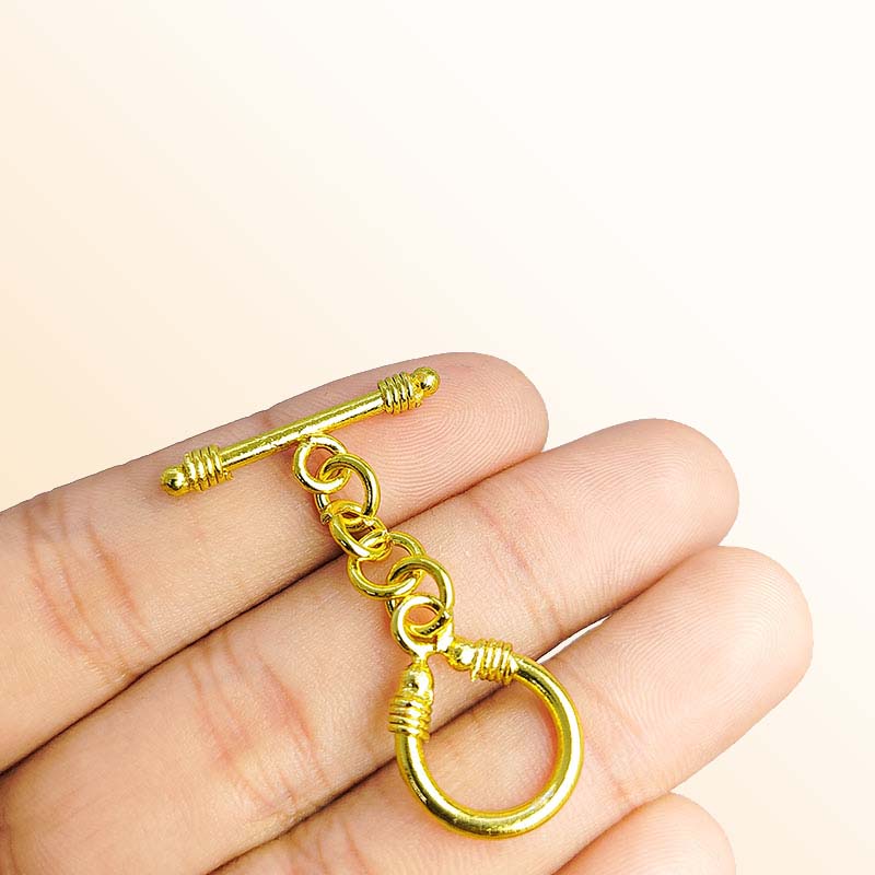 Handmade 18K gold overlay toggle clasp with polished decorative loop and elongated bar, crafted in India for bracelets and necklaces