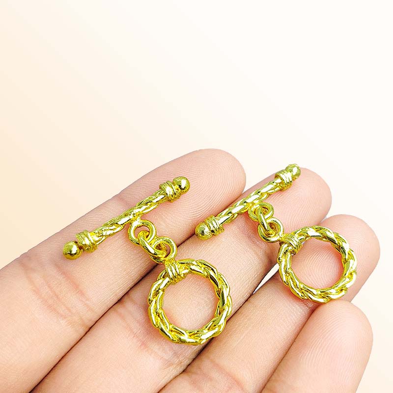 Handmade 18K gold overlay toggle clasp with polished braided rope ring and twisted bar, crafted in India for bracelets and necklaces