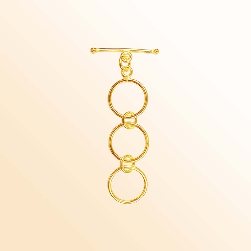 Elegant 18K gold overlay toggle clasp with interlinked rings and bar closure, handcrafted in India, perfect for bracelets and necklaces.