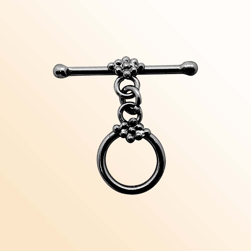 Handcrafted Black Rhodium Overlay floral toggle clasp jewelry with ball accents and circular ring, made in India.