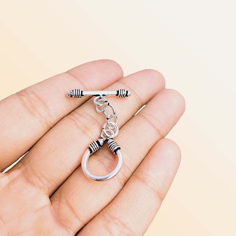 Decorative Silver Overlay toggle clasp with bar, chain link connector, and U-shaped ring, oxidized finish, artisan jewelry fastener for bracelets and necklaces.
