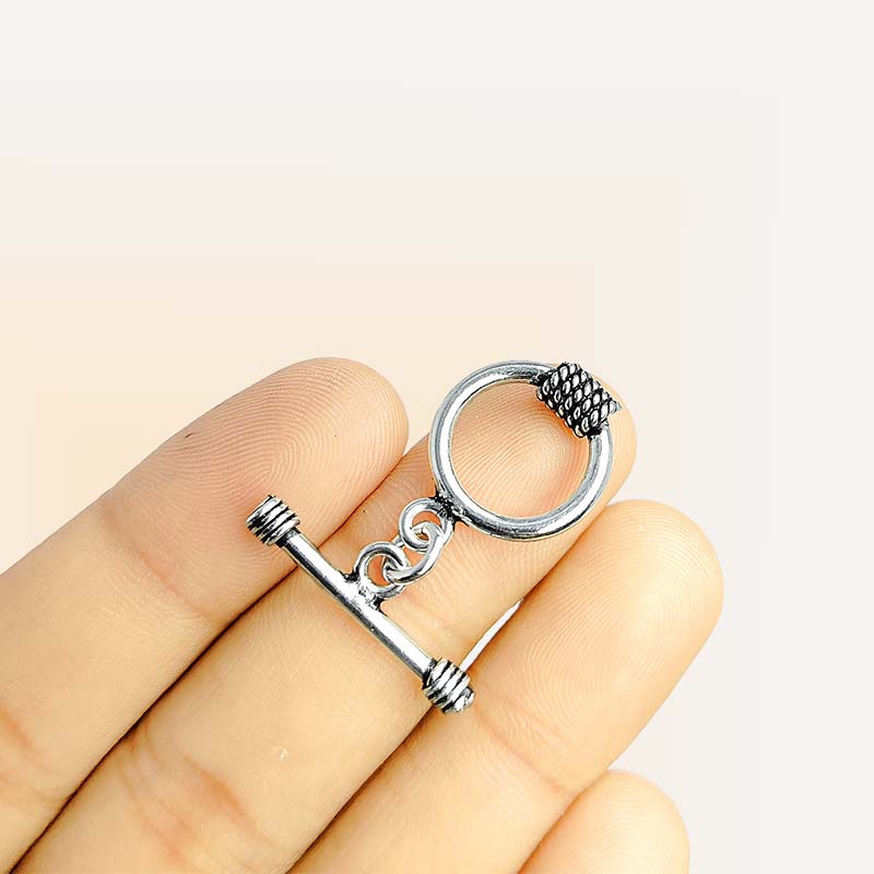 Silver Overlay rope-edge toggle clasp for jewelry making, polished accessory ideal for bracelets and necklaces.