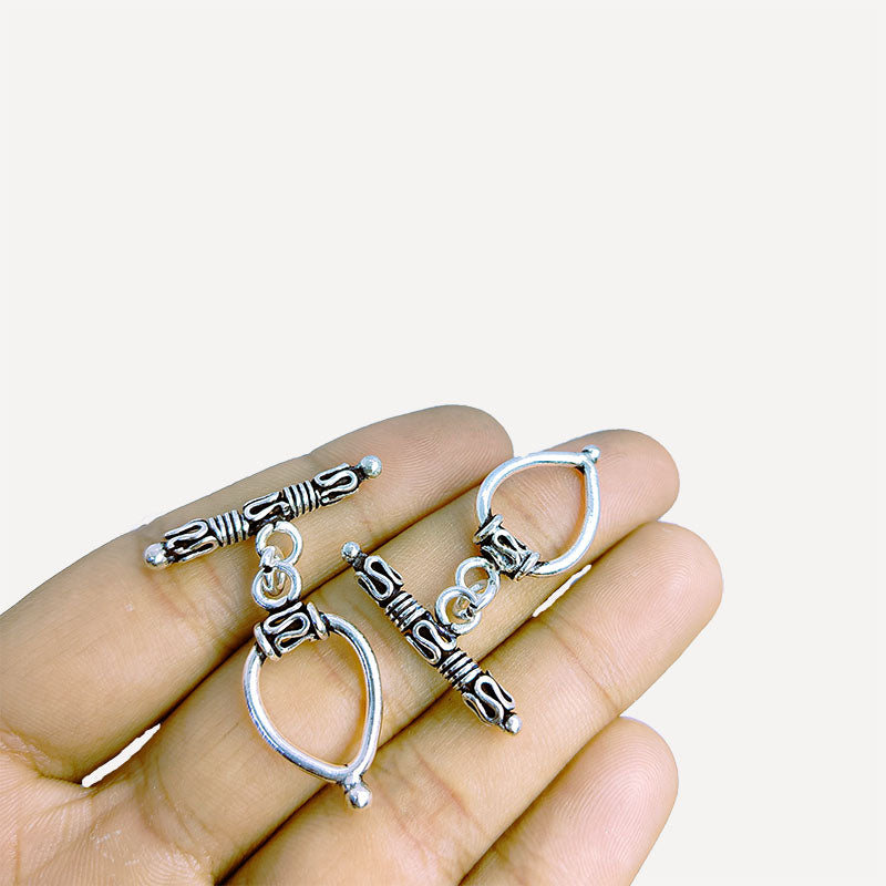 Bulk Silver Overlay teardrop toggle fastener with decorative bar, wholesale Bali jewelry finding for bracelets and necklaces.