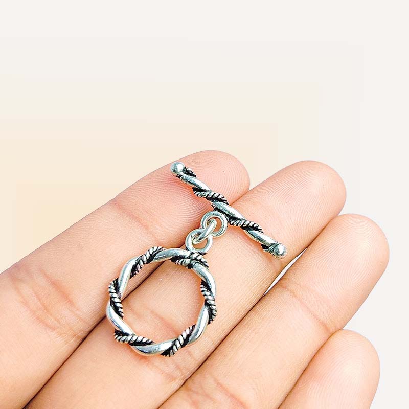 Handcrafted Silver Overlay rope-style toggle clasp – decorative jewelry connector for bracelets and necklaces.