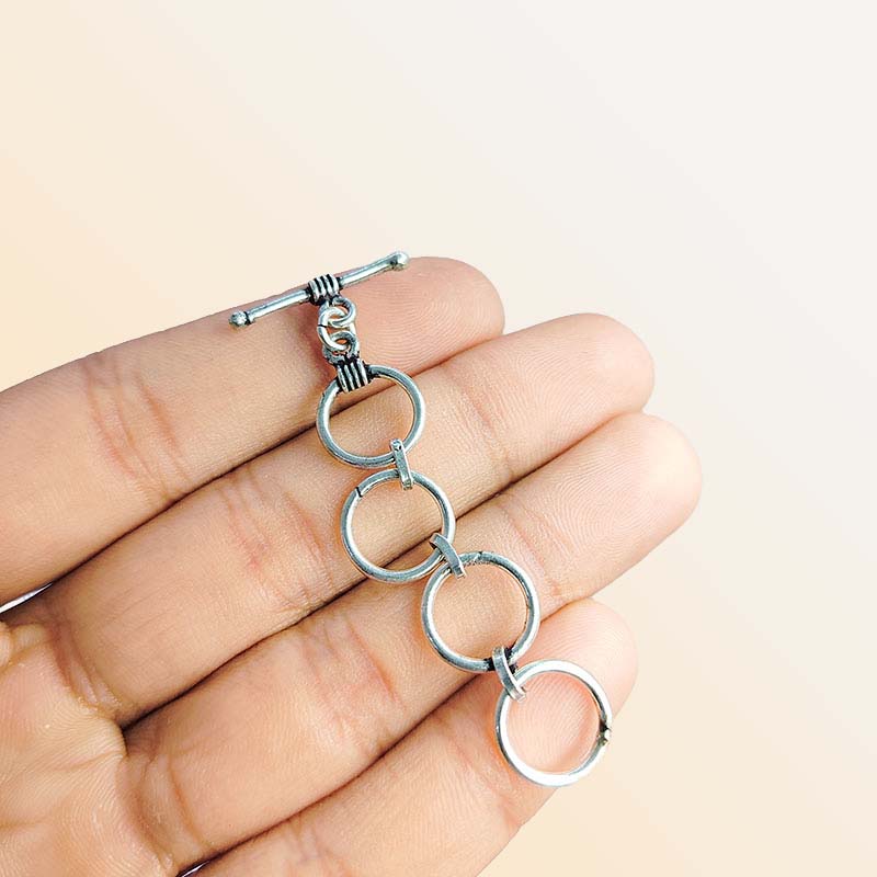 Elegant Silver Overlay toggle clasp with four smooth interlinked rings and a polished bar closure, perfect for bracelets, necklaces, and DIY jewelry projects.