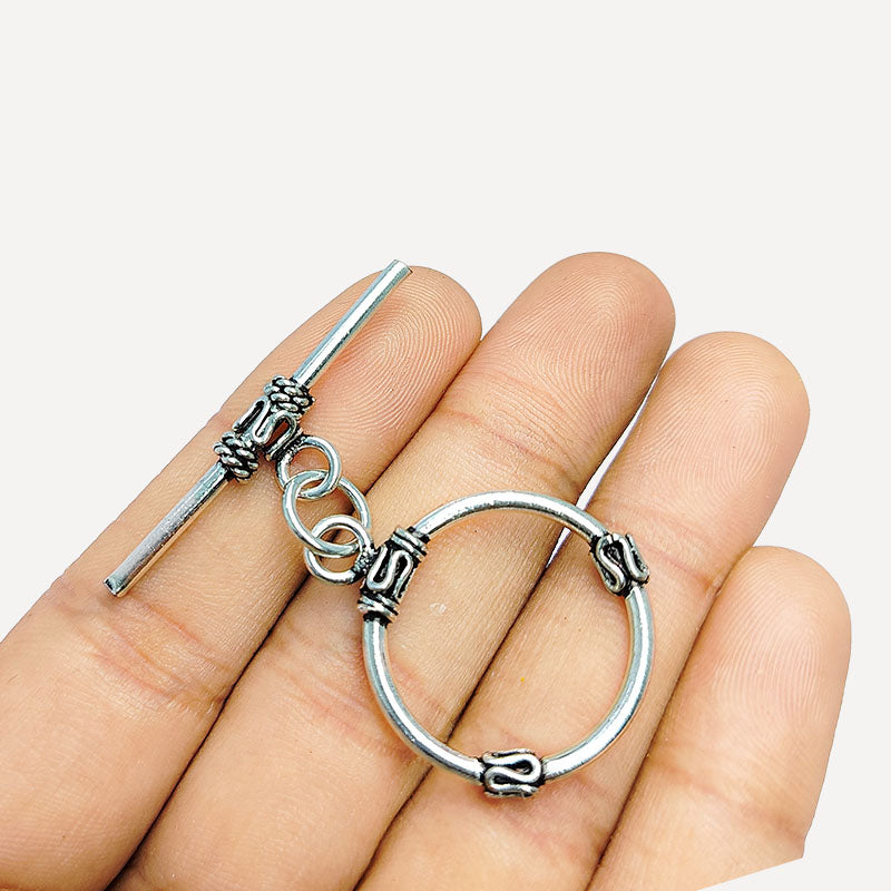 Elegant Silver Overlay decorative oval toggle clasp, handcrafted in India – polished loop and bar closure for necklaces and bracelets.