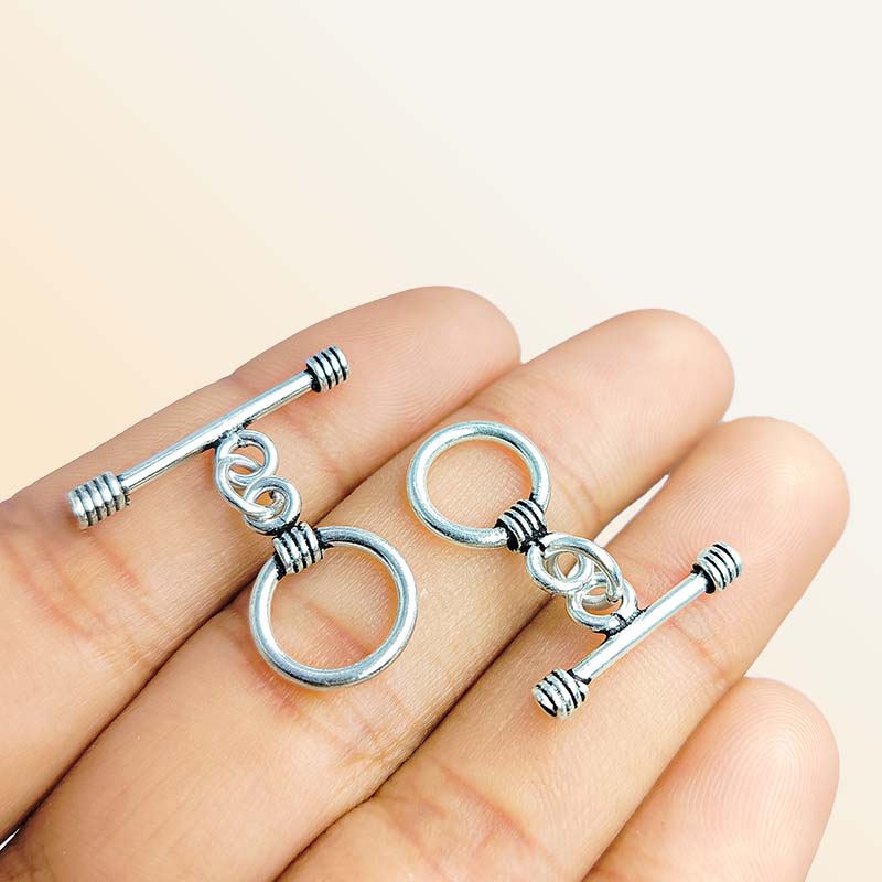 Polished Silver Overlay toggle closure with coil accents, handcrafted in India for bracelets and necklaces.