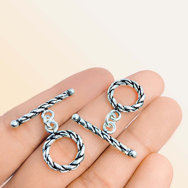 Polished Silver Overlay rope toggle closure with twisted design, handcrafted in India for bracelets and necklaces.