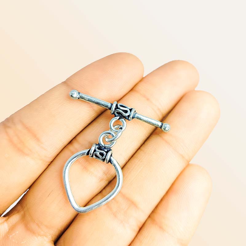 Elegant Silver Overlay heart toggle clasp with polished heart-shaped loop and bar design, perfect for necklaces and bracelets, handcrafted in India.