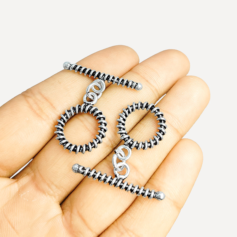 Elegant Silver Overlay textured toggle clasp with detailed circular loop and ridged bar design, perfect for necklaces and bracelets, handcrafted in India.