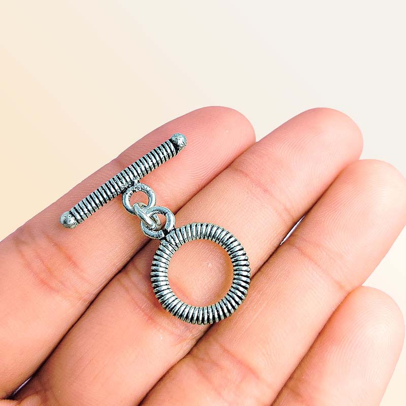 Elegant Silver Overlay coil round toggle clasp with detailed circular loop and matching bar design, perfect for necklaces and bracelets, handcrafted in India.