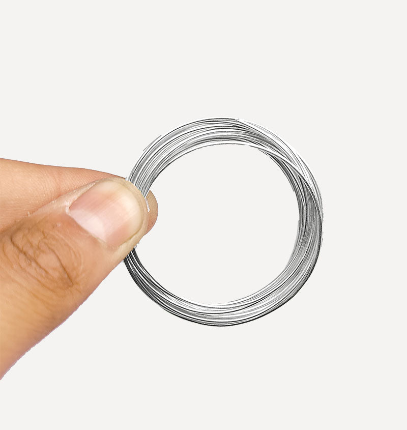 Premium silver gray round craft Elastic Wire on a spool with a smooth satin metallic finish, ideal for handmade jewelry, wire wrapping, beading, floral decorations, and creative DIY projects.
