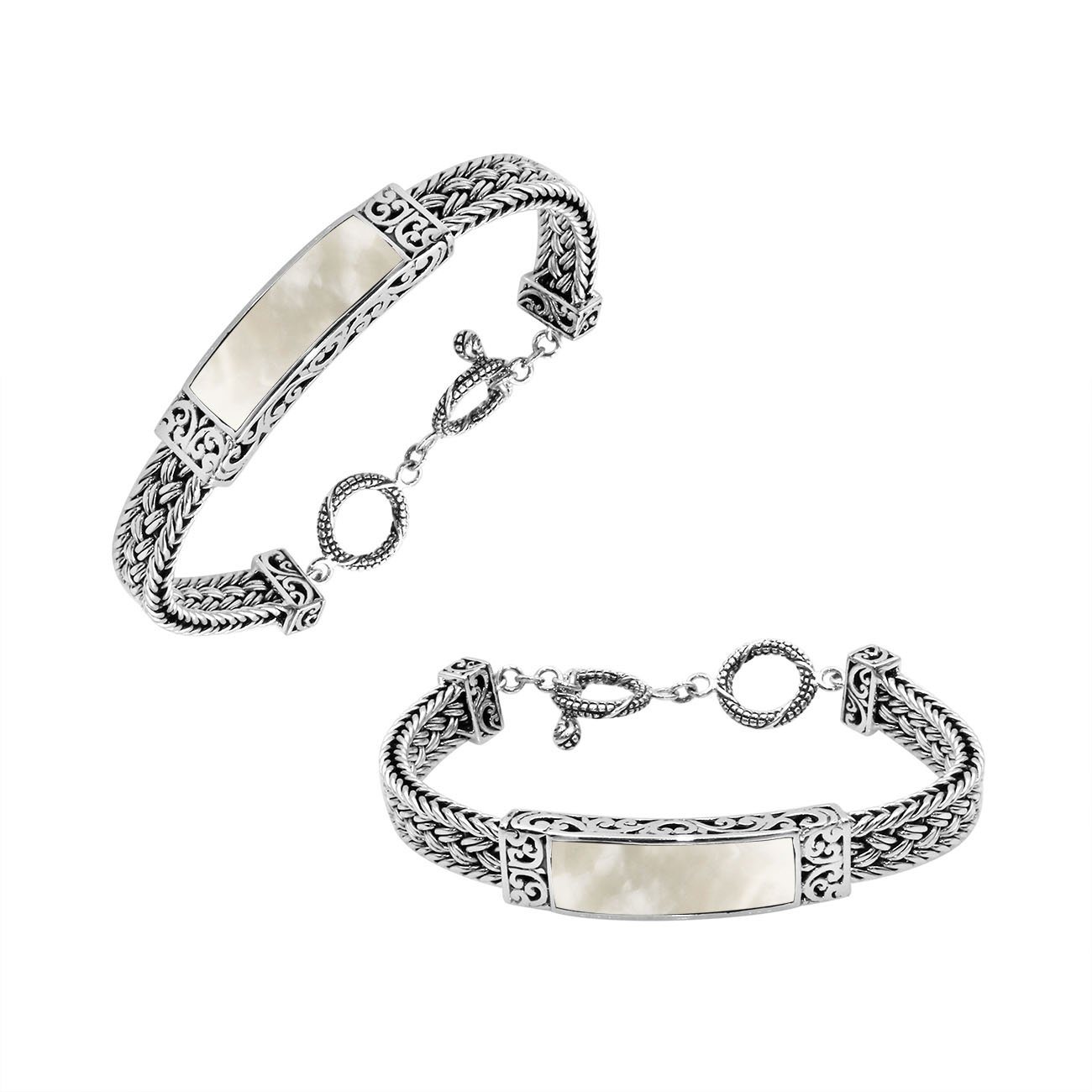 Handcrafted sterling silver bracelet with Mother Of Pearl inlay and toggle lock made in Bali.