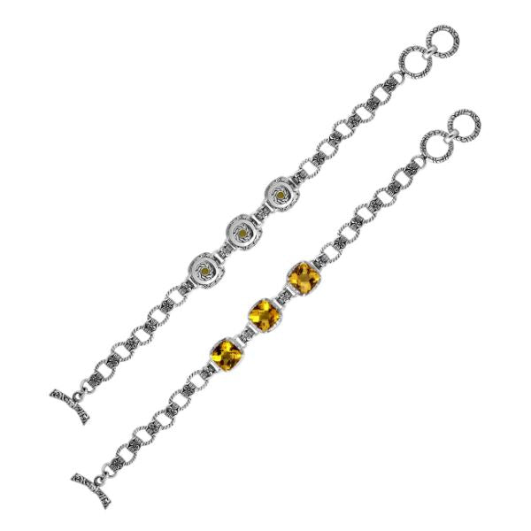 Retail sterling silver bracelet featuring luminous golden Citrine Quartz stones set in ornate Balinese-style frames with detailed chain accents and a refined toggle lock for daily elegance.