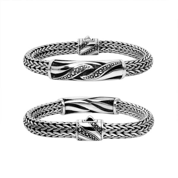 Sterling silver Bali woven bracelet showcasing an engraved centerpiece and artistic push clasp, designed for women seeking bold, expressive, and elegant everyday jewelry.