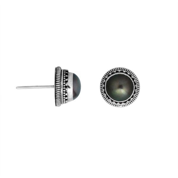 Silver stud earrings featuring Gray Pearls with ornate dotted Bali detailing.