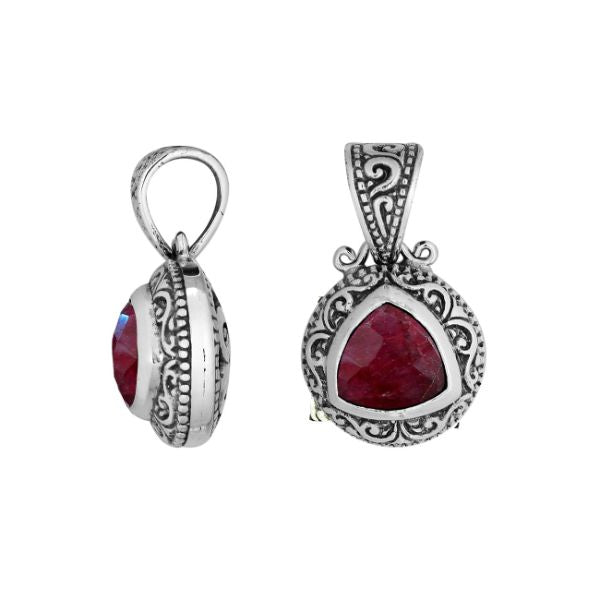 Elegant sterling silver triangular pendant with Ruby Quartz and Balinese handcrafted detailing