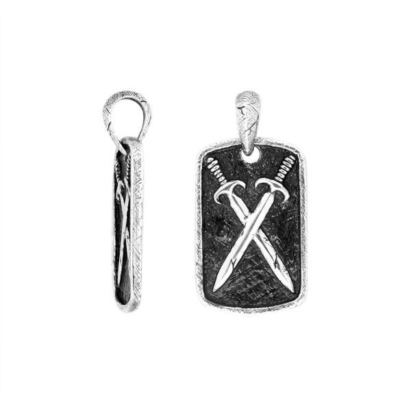 Artistic sterling silver rectangular pendant featuring engraved crossed swords on a textured background with polished edges for a bold modern jewelry style